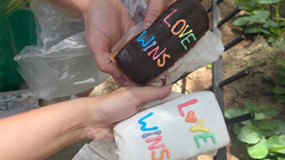 Colorful rocks that say LOVE WINS