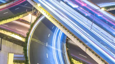 Ivans Download for Agents Light traces of traffic at night in a city