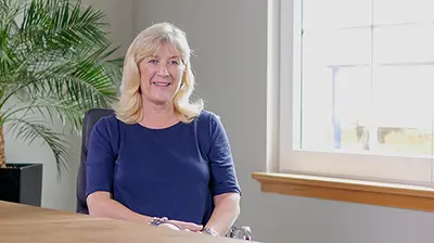 Quality Care Insurance Services A woman being interviewed