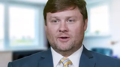 Talladega Insurance Agency  A businessman speaking in an interview