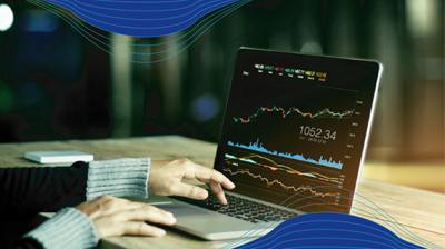 The Forrester Wave™: Digital Insurance Agency Platforms, Q1 2022 Hands using a laptop to review analytics